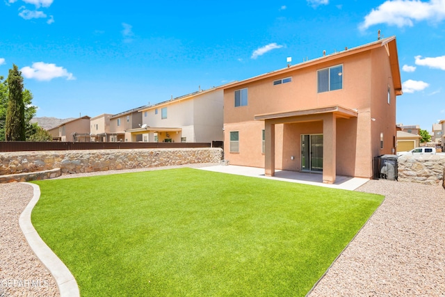 5036 Silver Ranch Ave, El Paso, TX 79934 - back of property with stucco siding, a patio area, and a residential view