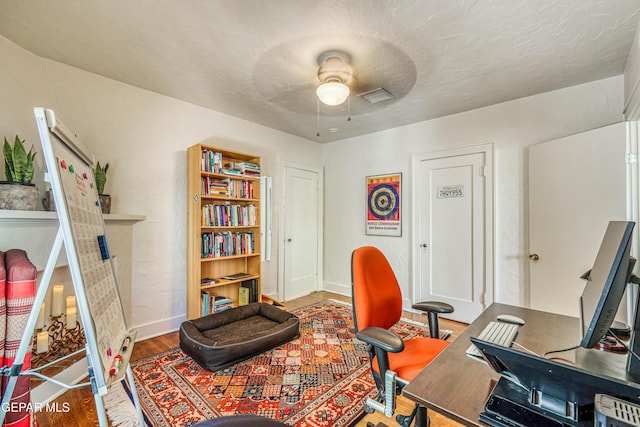 4021 Hastings Dr, El Paso, TX 79903 - office featuring a ceiling fan and wood finished floors