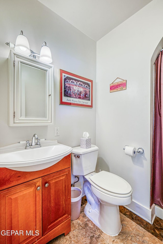 4021 Hastings Dr, El Paso, TX 79903 - full bath featuring vanity, stone finish floors, and a shower with curtain