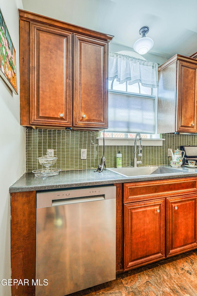 4021 Hastings Dr, El Paso, TX 79903 - kitchen with stainless steel dishwasher and backsplash