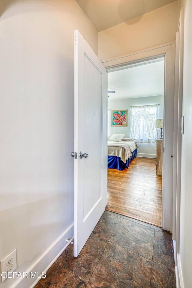 4021 Hastings Dr, El Paso, TX 79903 - hall with stone tile floors and baseboards