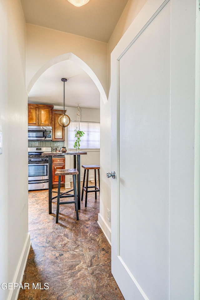 4021 Hastings Dr, El Paso, TX 79903 - corridor with arched walkways