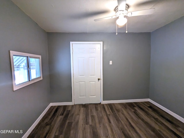 3308 Tularosa Ave, El Paso, TX 79903 - empty room with dark wood finished floors and ceiling fan