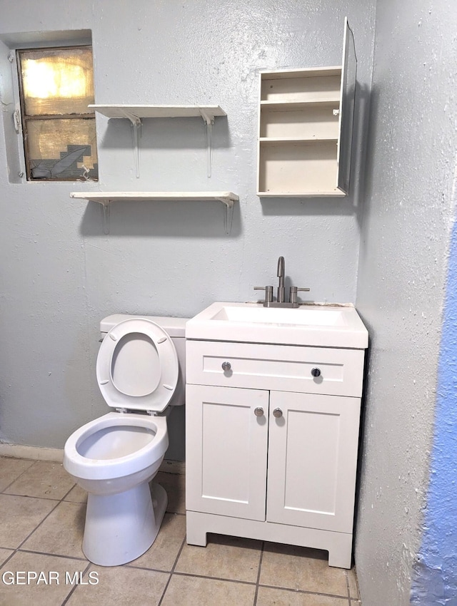 3308 Tularosa Ave, El Paso, TX 79903 - half bath with tile patterned flooring and vanity