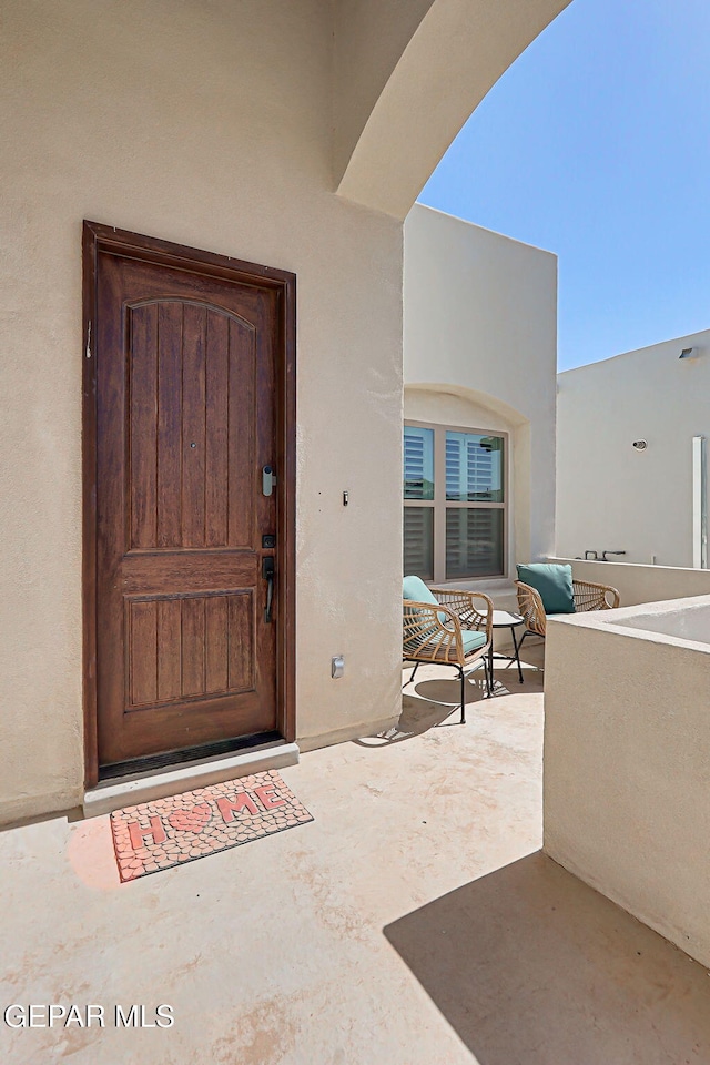 12820 Monmouth Ave, El Paso, TX 79928 - view of exterior entry featuring stucco siding