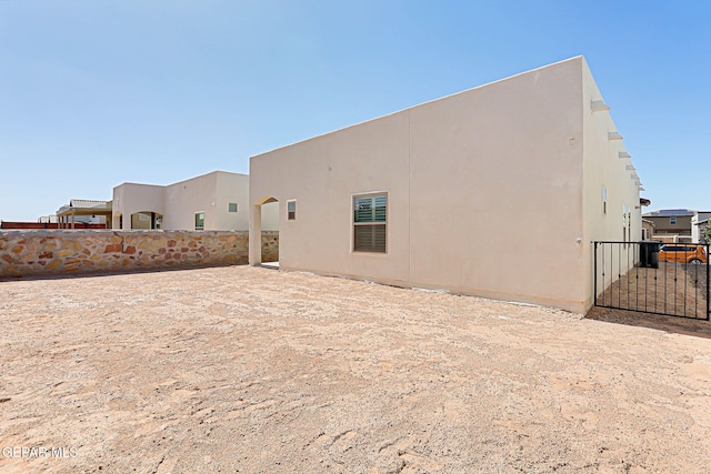 12820 Monmouth Ave, El Paso, TX 79928 - back of property with stucco siding