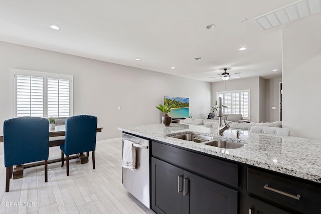 12820 Monmouth Ave, El Paso, TX 79928 - kitchen with dishwasher, a ceiling fan, light stone counters, open floor plan, and recessed lighting