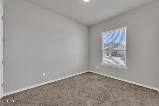 14772 John Mcneely Ave, El Paso, TX 79938 - carpeted empty room with baseboards