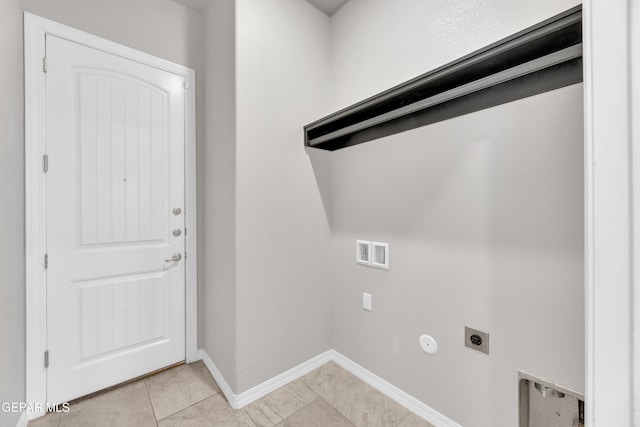 14772 John Mcneely Ave, El Paso, TX 79938 - laundry room featuring electric dryer hookup, hookup for a gas dryer, hookup for a washing machine, and light tile patterned floors