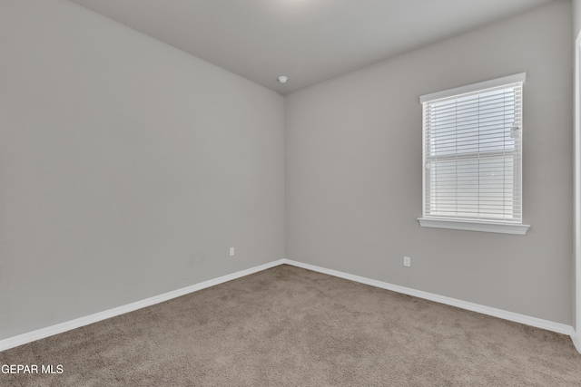14772 John Mcneely Ave, El Paso, TX 79938 - carpeted empty room featuring baseboards