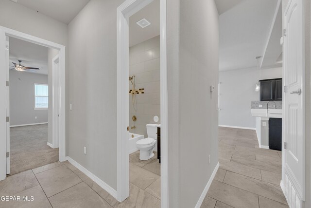 14772 John Mcneely Ave, El Paso, TX 79938 - hallway with light tile patterned floors