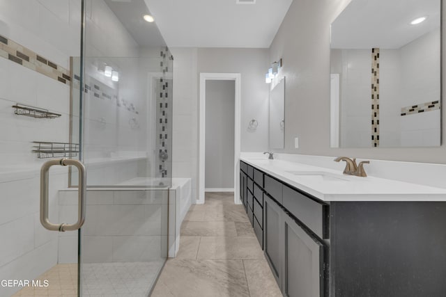 14772 John Mcneely Ave, El Paso, TX 79938 - full bathroom with a shower stall, double vanity, marble finish flooring, and recessed lighting