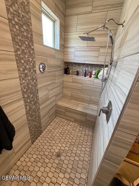2313 Dancing Piper Way, El Paso, TX 79911 - bathroom featuring tiled shower