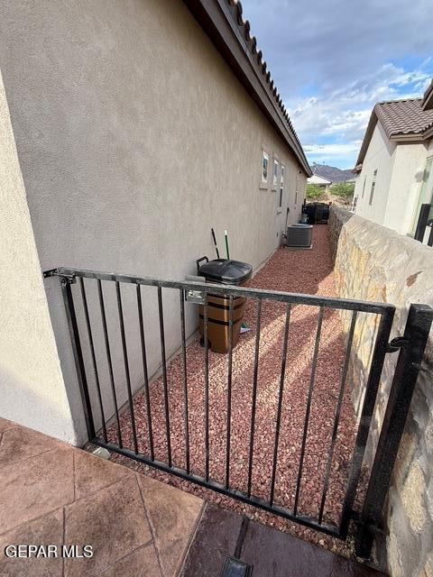 2313 Dancing Piper Way, El Paso, TX 79911 - view of property exterior with stucco siding and a tiled roof