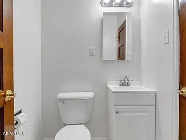 3305 Killarney St, El Paso, TX 79925 - half bathroom featuring vanity and toilet