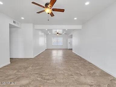 3305 Killarney St, El Paso, TX 79925 - unfurnished living room with a ceiling fan and recessed lighting