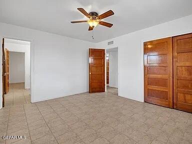 3305 Killarney St, El Paso, TX 79925 - unfurnished bedroom featuring ceiling fan