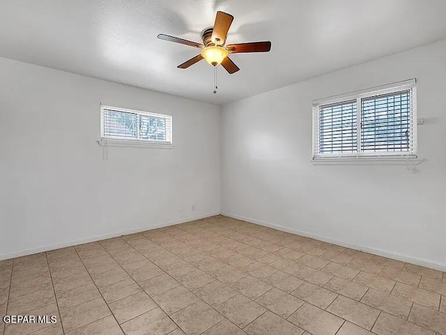 3305 Killarney St, El Paso, TX 79925 - spare room featuring ceiling fan and baseboards
