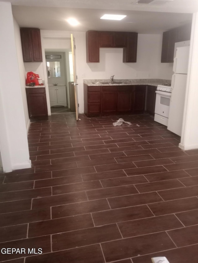 4008 Tularosa Ave, El Paso, TX 79903 - kitchen with white appliances and light countertops