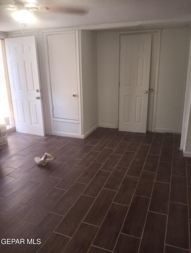 4008 Tularosa Ave, El Paso, TX 79903 - unfurnished bedroom featuring wood tiled floors and baseboards