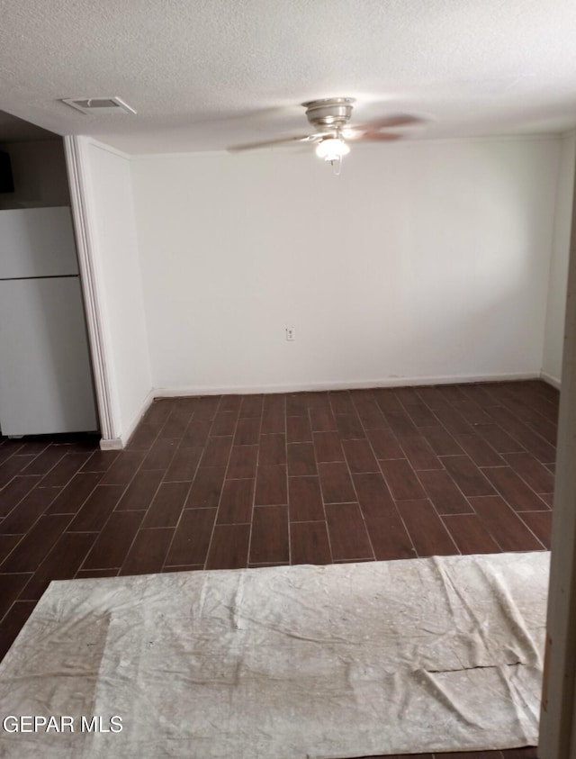 4008 Tularosa Ave, El Paso, TX 79903 - spare room featuring ceiling fan and a textured ceiling