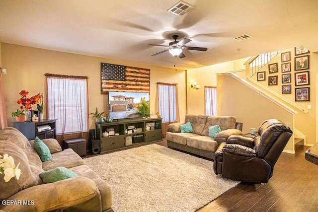5004 Gold Ranch Ave, El Paso, TX 79934 - living area featuring dark wood finished floors, a ceiling fan, and stairway