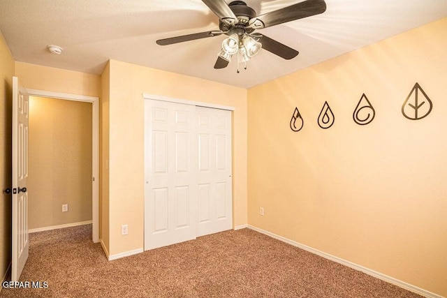 5004 Gold Ranch Ave, El Paso, TX 79934 - unfurnished bedroom featuring carpet floors, a closet, and a ceiling fan