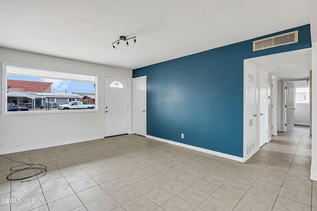 4956 Rutherford Dr, El Paso, TX 79924 - tiled foyer featuring healthy amount of natural light
