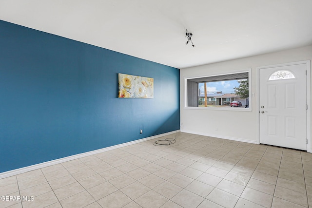 4956 Rutherford Dr, El Paso, TX 79924 - foyer featuring baseboards and light tile patterned flooring