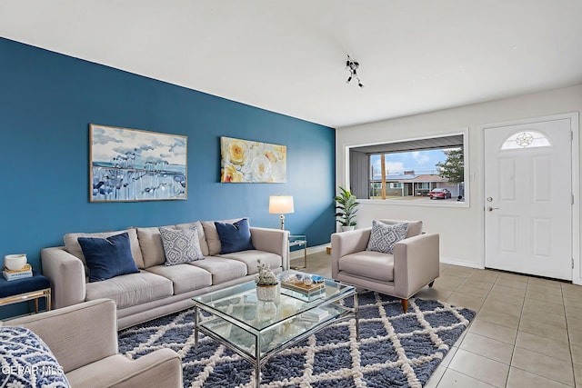 4956 Rutherford Dr, El Paso, TX 79924 - living area featuring tile patterned flooring and baseboards