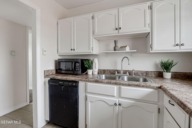 4956 Rutherford Dr, El Paso, TX 79924 - kitchen featuring black appliances, white cabinets, light tile patterned floors, and open shelves