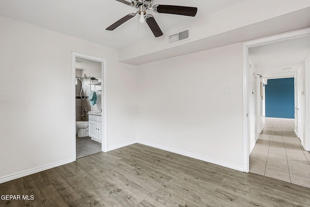 4956 Rutherford Dr, El Paso, TX 79924 - spare room with a ceiling fan and wood finished floors