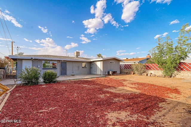4956 Rutherford Dr, El Paso, TX 79924 - back of property with a fenced backyard, brick siding, a patio area, and a gate