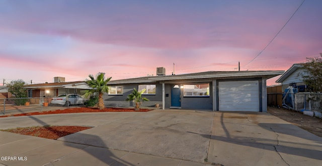 4956 Rutherford Dr, El Paso, TX 79924 - ranch-style house with concrete driveway and brick siding