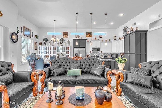 12328 Desert Heights Ct, El Paso, TX 79938 - living room with healthy amount of natural light, a chandelier, and recessed lighting