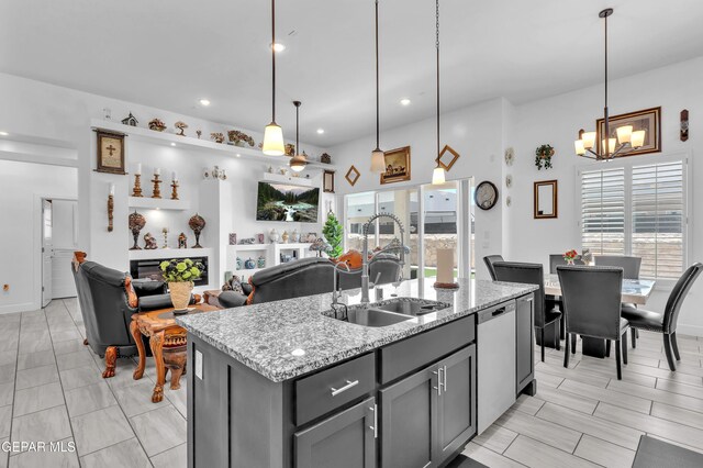 12328 Desert Heights Ct, El Paso, TX 79938 - kitchen with stainless steel dishwasher, gray cabinets, a chandelier, hanging light fixtures, and recessed lighting