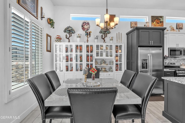 12328 Desert Heights Ct, El Paso, TX 79938 - dining room featuring a chandelier