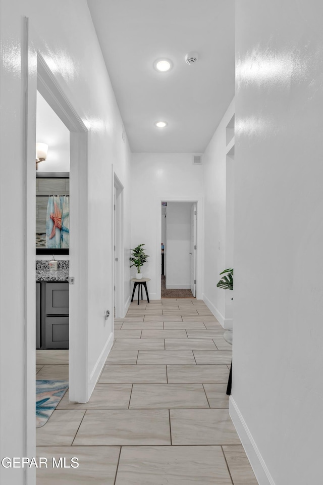 12328 Desert Heights Ct, El Paso, TX 79938 - hall with baseboards and recessed lighting