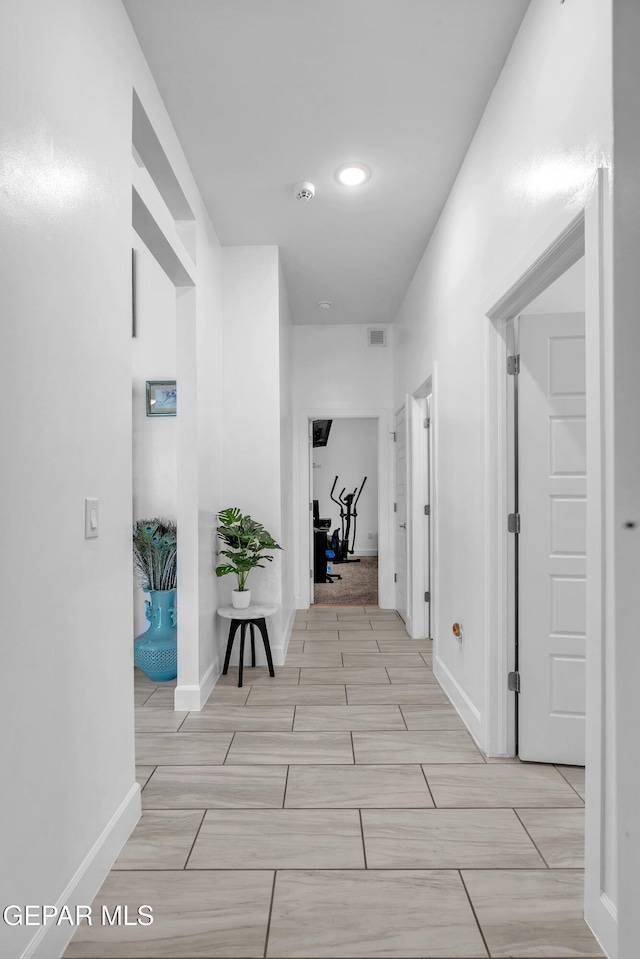 12328 Desert Heights Ct, El Paso, TX 79938 - hall with wood tiled floors and baseboards