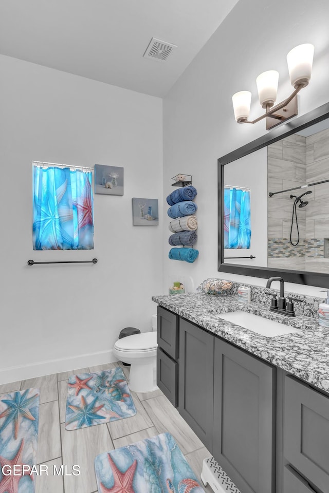 12328 Desert Heights Ct, El Paso, TX 79938 - full bathroom with vanity and tiled shower