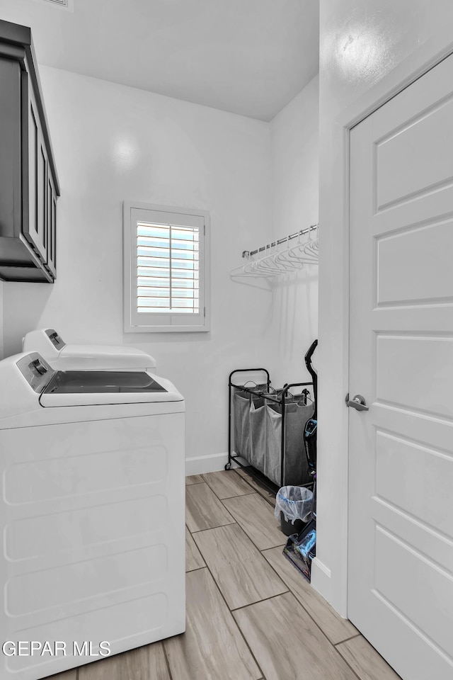 12328 Desert Heights Ct, El Paso, TX 79938 - washroom featuring separate washer and dryer and cabinet space