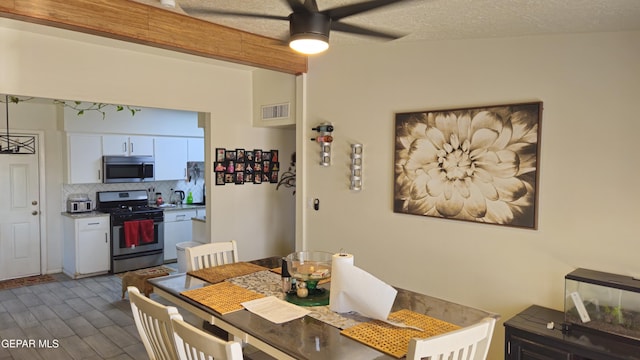5028 Sagittarius Ave, El Paso, TX 79924 - dining room with ceiling fan