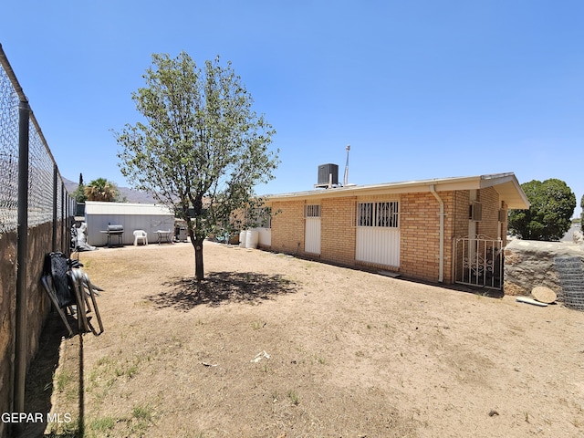 5028 Sagittarius Ave, El Paso, TX 79924 - back of property with brick siding