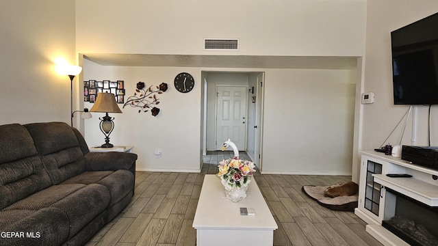5028 Sagittarius Ave, El Paso, TX 79924 - living room featuring wood finished floors