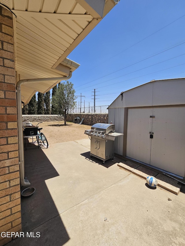5028 Sagittarius Ave, El Paso, TX 79924 - view of patio / terrace with a storage unit and grilling area