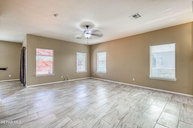14376 N Cave Dr, El Paso, TX 79938 - spare room featuring ceiling fan and baseboards