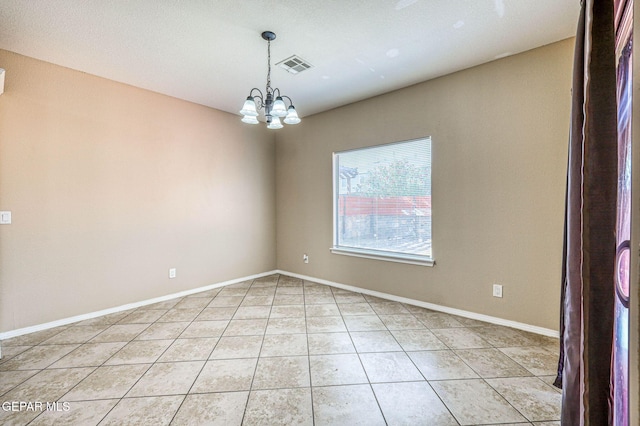 14376 N Cave Dr, El Paso, TX 79938 - spare room featuring light tile patterned flooring and a chandelier