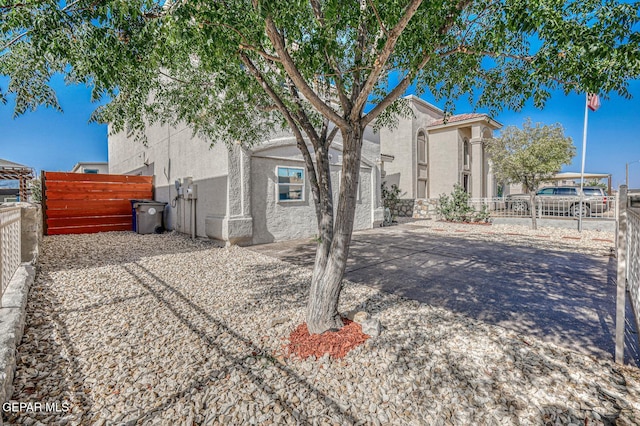 14376 N Cave Dr, El Paso, TX 79938 - view of front facade featuring stucco siding