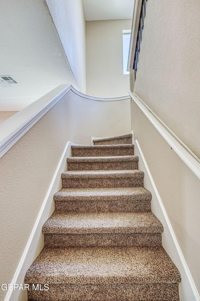 14376 N Cave Dr, El Paso, TX 79938 - stairway with a textured wall