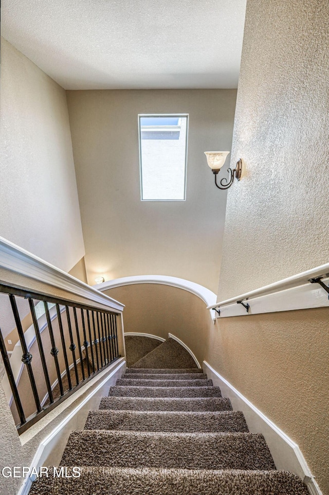 14376 N Cave Dr, El Paso, TX 79938 - stairway featuring a textured wall